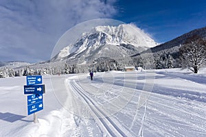 Winter mountain landscape with groomed ski trails