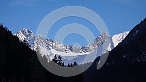 Winter mountain landscape of the Parc Ela Park in southeastern Switzerland on a beautiful winter day