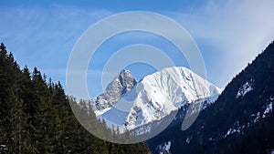 Winter mountain landscape of the Parc Ela Park in southeastern Switzerland on a beautiful winter day