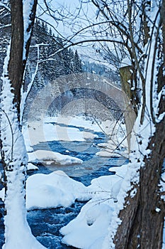 Winter mountain river after the snowfall