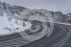 Winter mountain road turn