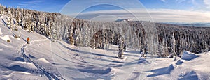 Winter mountain scene with a backcountry skier