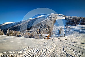 Winter mountain snowy landscape at a sunny day