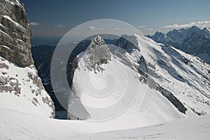 Winter mountaineers in Julian Alps photo