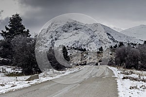 Country road in the highlands Greece, Peloponnese on a winter, snowy day