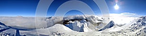 Winter in the mountains. Hiking during wintertime. Snow storm in the high mountains