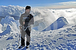 Winter in the mountains. Hiking during wintertime. Snow storm in the high mountains