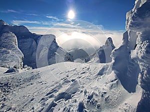 Winter in the mountains. Hiking during wintertime. Snow storm in the high mountains