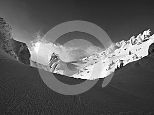 Winter in the mountains. Hiking during wintertime. Snow storm in the high mountains