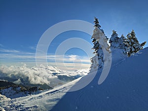 Winter in the mountains. Hiking during wintertime. Snow storm in the high mountains