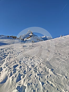 Winter in the mountains. Hiking during wintertime. Snow storm in the high mountains