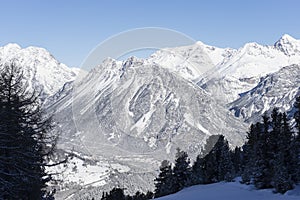 Winter mountains landscape with village