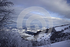 Winter in the mountains, snowy trees with frost, beautiful