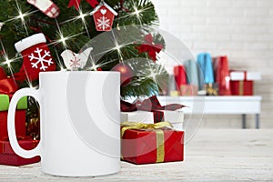 Winter Mug mockup, blank cup with Christmas background. New yars decoration on festive background