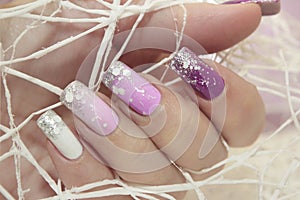 Winter multi-colored lilac pastel manicure