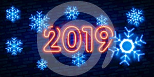 Winter neon. snowflakes with glow. 2019 Happy New Year Neon lights design, Merry Christmas and Xmas background, retro card, vector