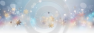 Winter, New Year or Christmas abstract background with snowflakes, glitter and bokeh on a light background