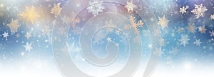 Winter, New Year or Christmas abstract background with snowflakes, glitter and bokeh on a light background