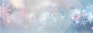 Winter, New Year or Christmas abstract background with snowflakes, glitter and bokeh on a light background