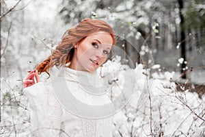 Winter nice woman portrait in december forest