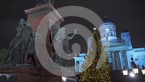 Winter night scenery of Senate Square with Christmas Tree and Senate building in Helsinki, Finland