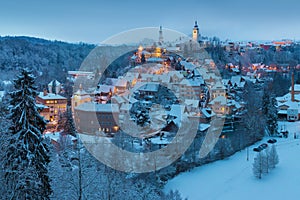 Winter night view at Nove Mesto nad Metuji, near Hradec Kralove, Czech republic. Panorama of the city with the castle