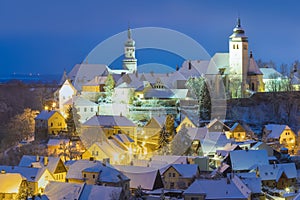 Winter night view at Nove Mesto nad Metuji, near Hradec Kralove, Czech republic. Panorama of the city with the castle