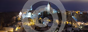 Winter night view at Nove Mesto nad Metuji, near Hradec Kralove, Czech republic. Panorama of the city with the castle