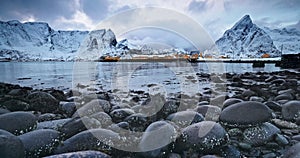 Winter nordic panorama landscape of rocky sea coastal shore Sakrisoy fishing village, Lofoten islands, Norway