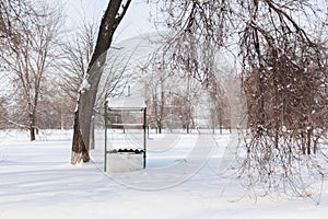 Winter. An old water well is covered in snow