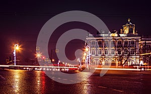Winter Palace Hermitage and quay at crossroads at night in St. Petersburg