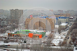 Winter panorama of the city overlooking Voroshilov Street and the renovated building of the former Youth Palace.