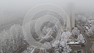 Winter panorama of the city of Togliatti in dense morning fog.