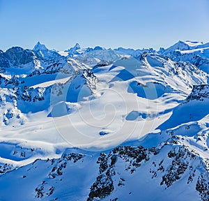 Winter panorama landscape from Mont Fort and famous Matterhorn, Dent d`Herens, Dents de Bouquetins, Weisshorn; Tete Blanche in th photo