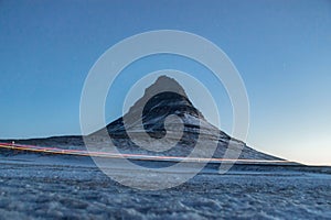 Winter panorama view of Kirkjufell mountain blue hour sunrise in Grundarfjordur Snaefellsnes Peninsula Western Iceland