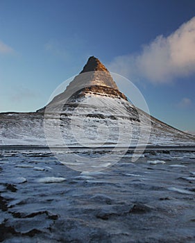 Winter panorama view of Kirkjufell mountain blue hour sunrise in Grundarfjordur Snaefellsnes Peninsula Western Iceland