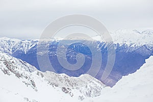 Winter panorama view of mountains. Cold winter maille cloudy day in mountains