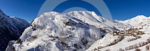 Winter panoramic view on the Village of Le Chazelet in the Ecrins National Park. Hautes-Alpes, Alps, Fr