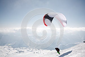 Winter paragliding in Gudauri mountains