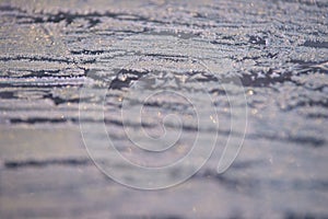 Winter pattern. White snowflakes. Grey colour. Boke