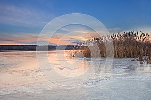 Winter paysage landscape of sunset evening iced river