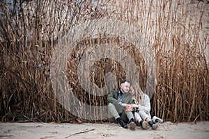 Winter picnic in forest. Love story on winter foggy sand beach. valentines concept. cloudy foggy day in forest and beach