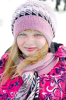Winter portrait of the beautiful girl