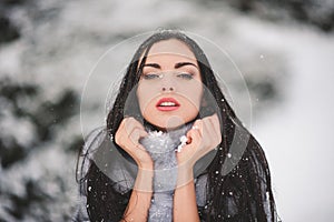 Winter portrait of Beauty girl with snow