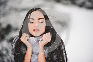 Winter portrait of Beauty girl with snow