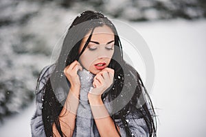 Winter portrait of Beauty girl with snow