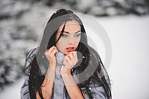 Winter portrait of Beauty girl with snow