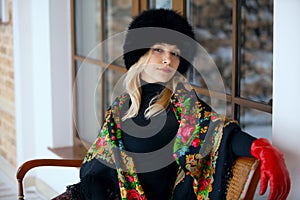 Winter portrait of the girl in colorful scarf