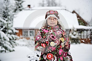 Winter portrait of playful child girl