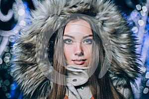 Winter portrait of young beautiful girl